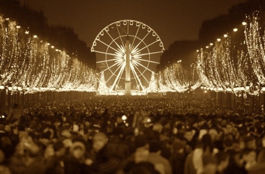 crowd and ferris wheel sepia1 520x342 The Best Places in the World to be on New Years Eve